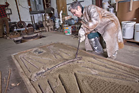 Gina Michaels at work in her studio.