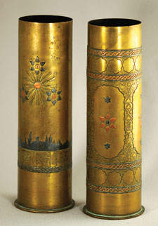 Capper artillery shell casings decorated.