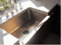 Copper sink in a metropolitan home.